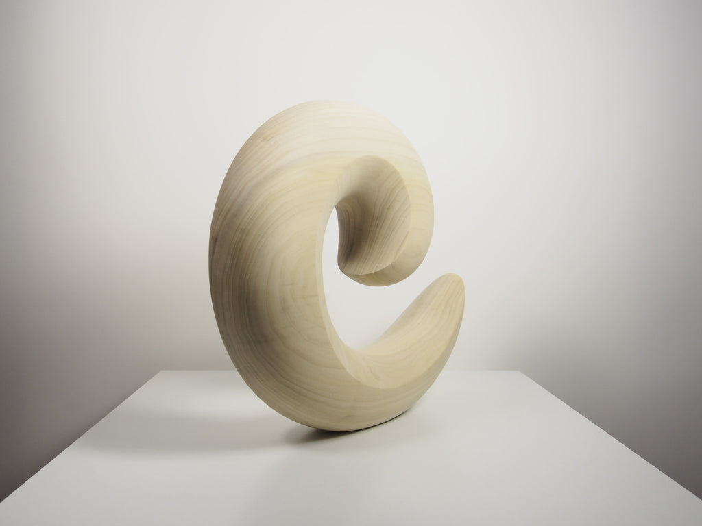 Spirála — Stolní socha